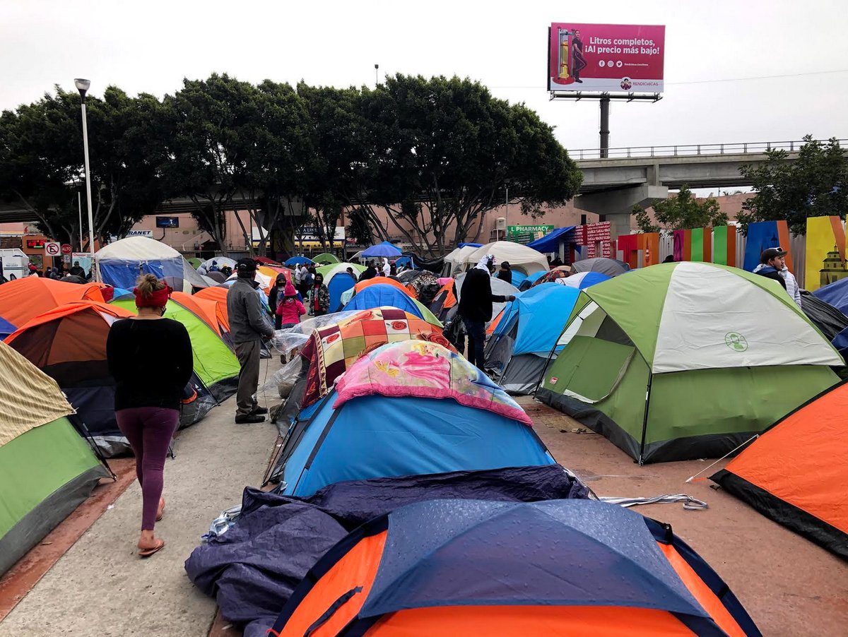 group of colorful camping tents at the border