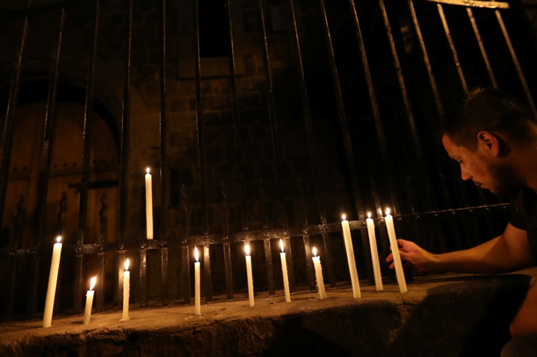 Man lighting candles