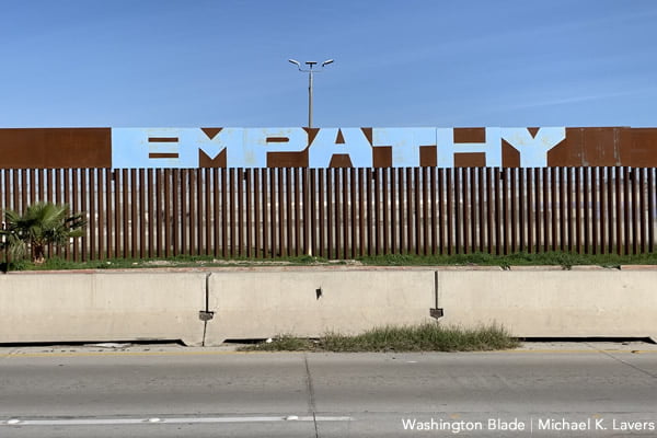 The word Empathy on the southern border wall